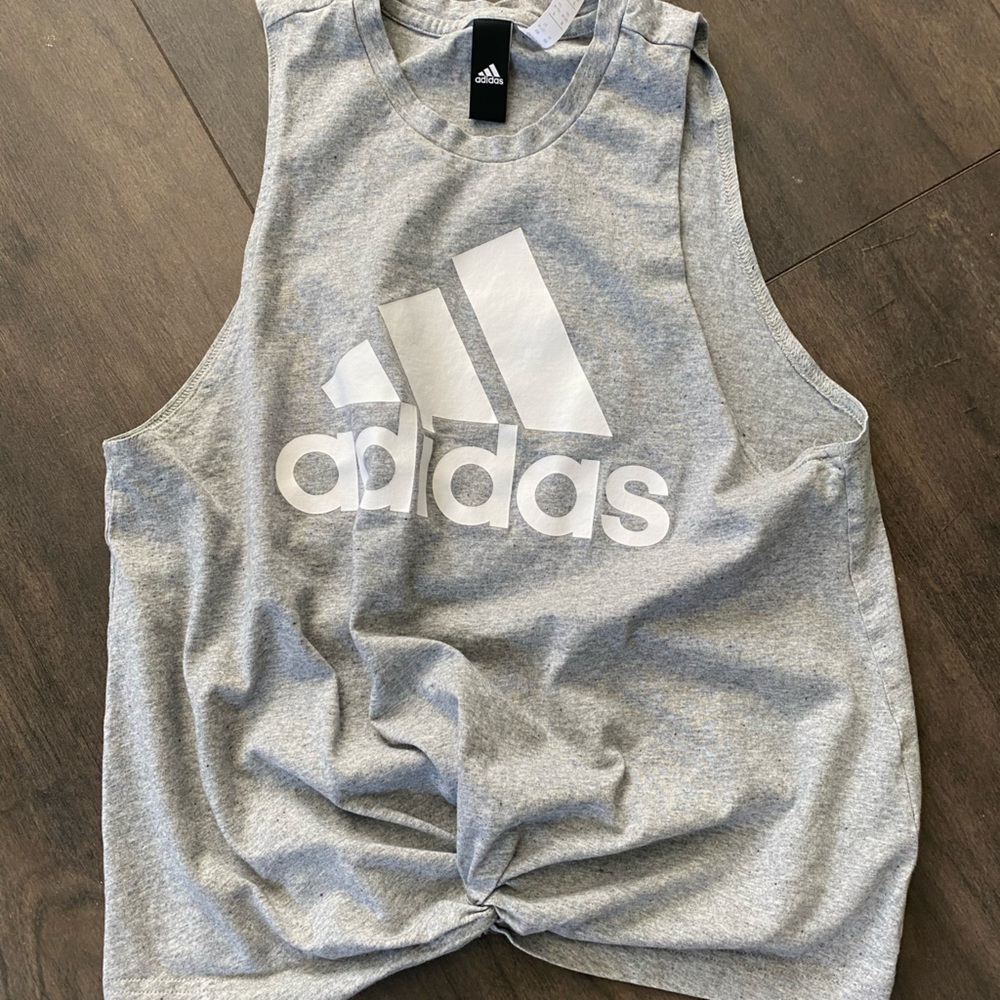 Women’s adidas sleeveless t-shirt.